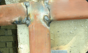 Construction of color steel pipe : When welding materials, be cautious of getting fire and damaging glass from welding sparks.